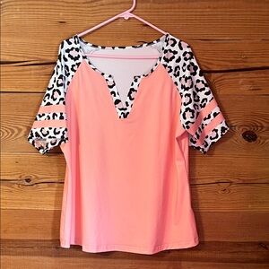 Vibrant Peach Women's Top with Leopard Print Sleeves
